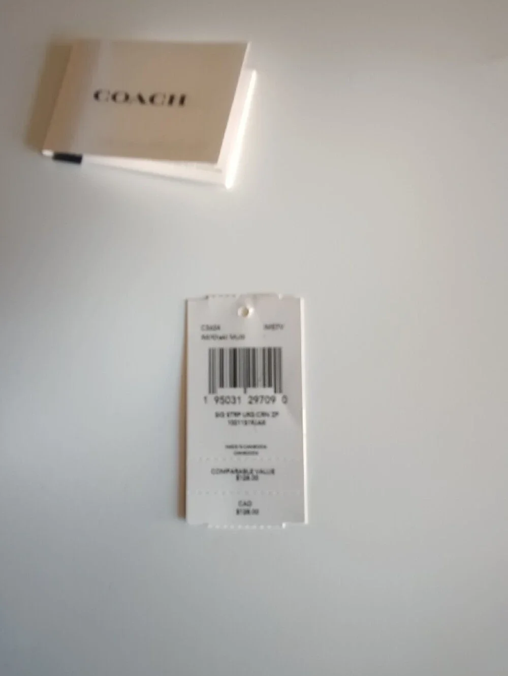COACH Signature Canvas Wristlet in Brown